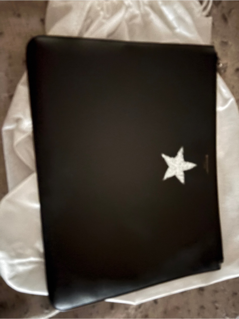 Givenchy star leather clutch 12 inch long x 10 inch high